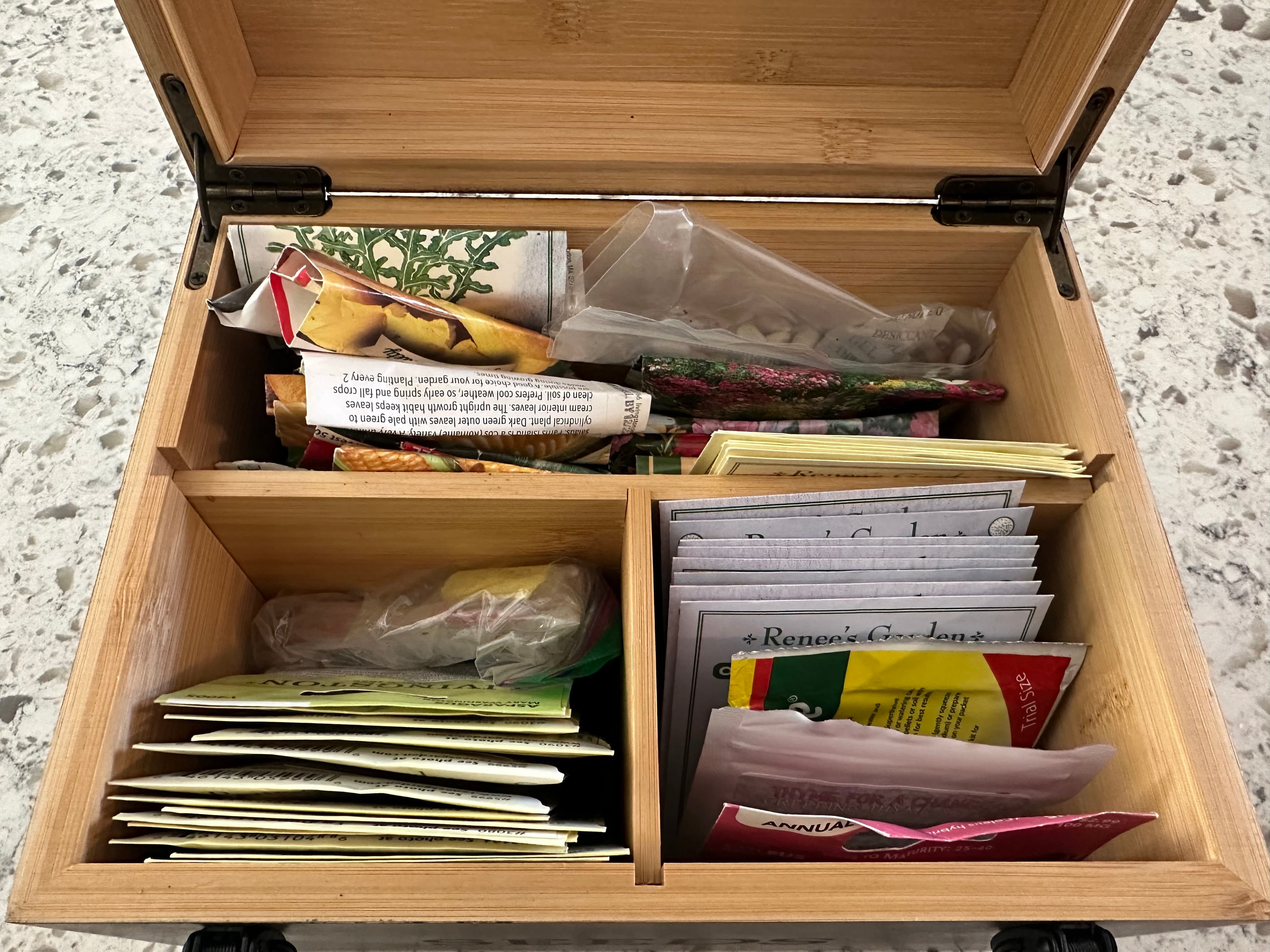 Organized vegetable and herb seed storage box used by YardCalc