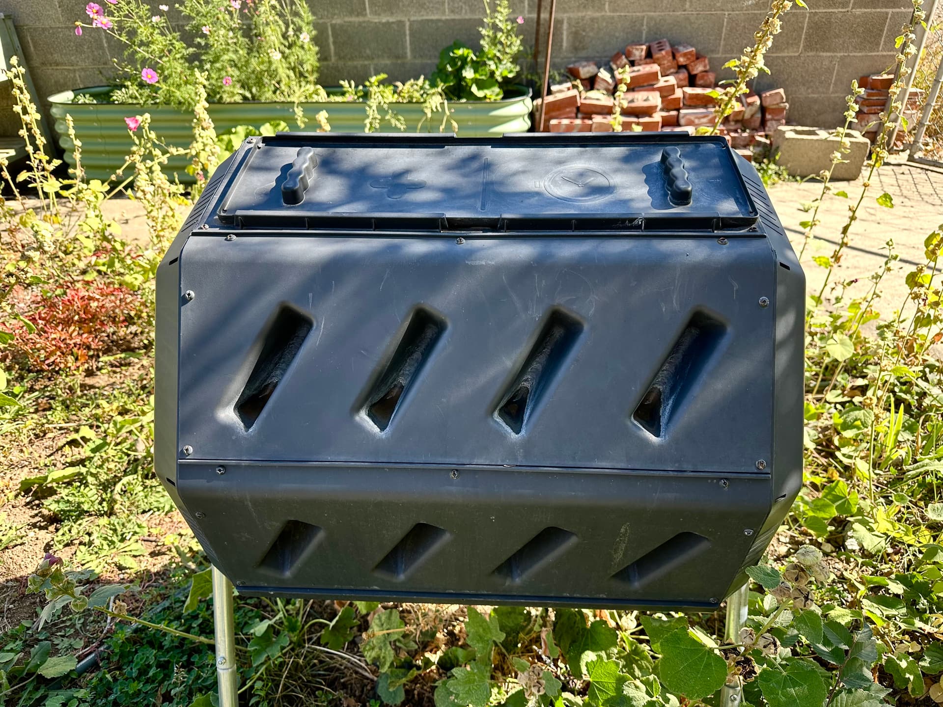 FCMP 37 gallon rotating steel composter used at home